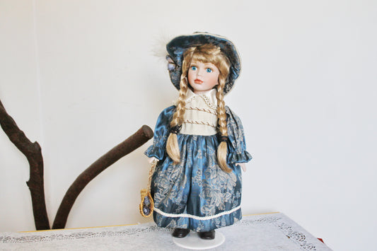Vintage porcelain Germany cute doll on a stand in beautiful blue dress - 16.5 inches - Collectible doll - 1970-1980s