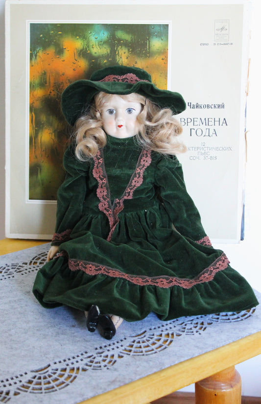 Vintage German Porcelain Doll in Green Velvet Dress with Hat – Fabric Body – Handcrafted Look – Visible Leg Repair - 1960-1980s