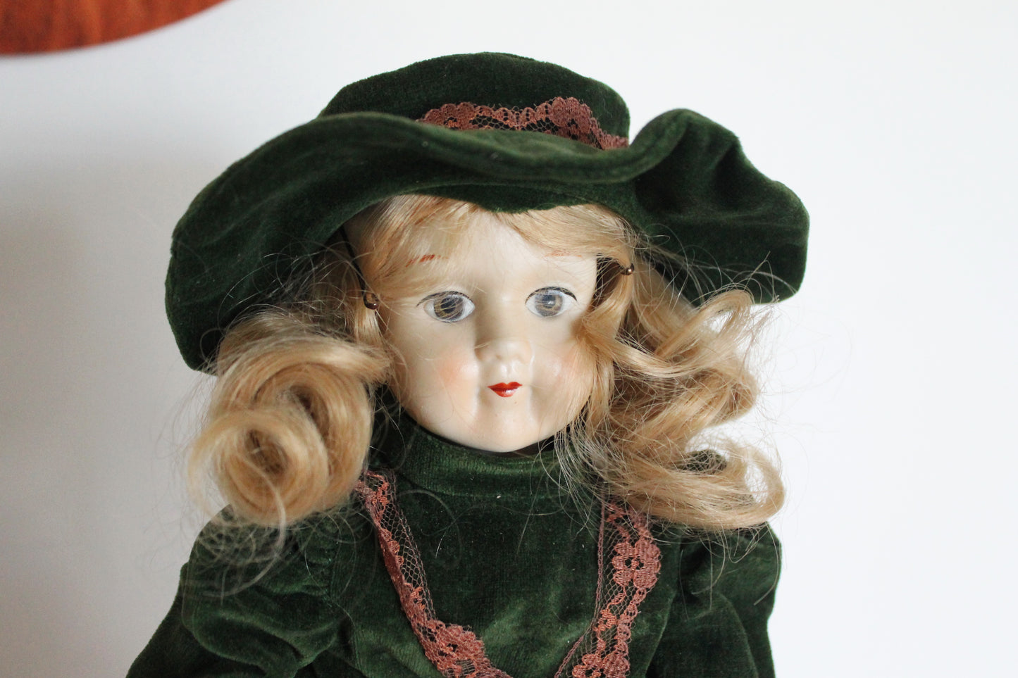Vintage German Porcelain Doll in Green Velvet Dress with Hat – Fabric Body – Handcrafted Look – Visible Leg Repair - 1960-1980s