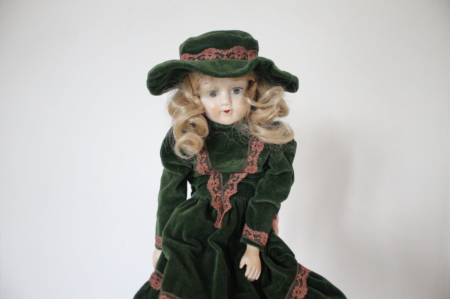 Vintage German Porcelain Doll in Green Velvet Dress with Hat – Fabric Body – Handcrafted Look – Visible Leg Repair - 1960-1980s
