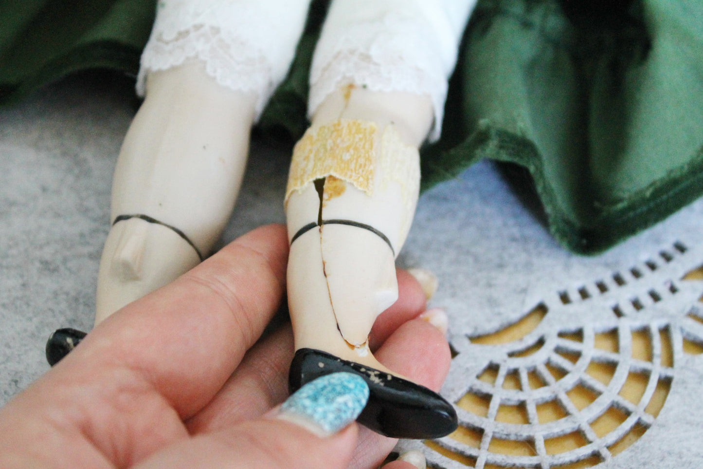 Vintage German Porcelain Doll in Green Velvet Dress with Hat – Fabric Body – Handcrafted Look – Visible Leg Repair - 1960-1980s
