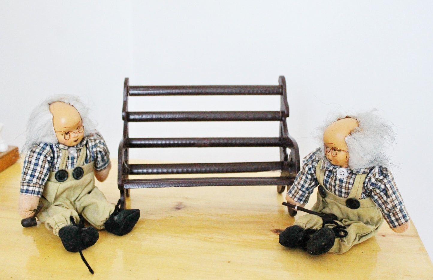 Two old men with hammers on a bench - vintage handmade Germany dolls - 1980s