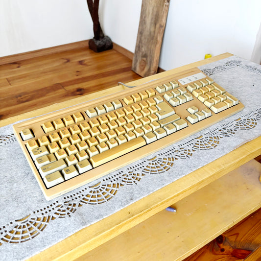 Vintage Mitsumi Wired Keyboard KFK-E4A4SA from 1990s 2000s – Retro Beige PC Accessory with Classic Layout, Number Pad, and Windows Keys – Collectible Old Computer Hardware, Yellowed with Age, Untested