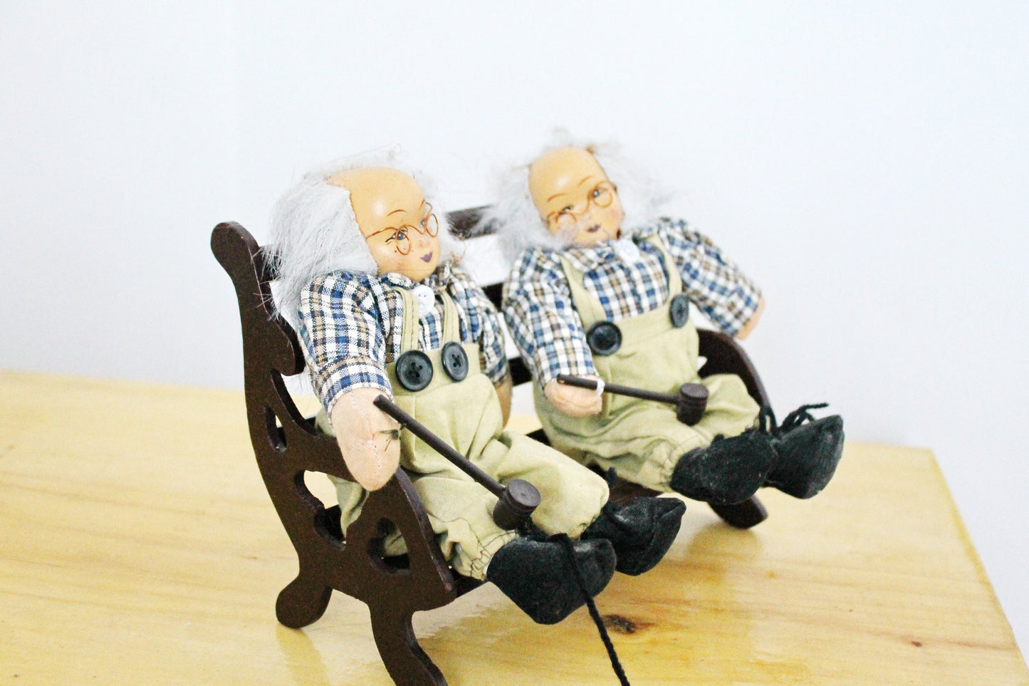 Two old men with hammers on a bench - vintage handmade Germany dolls - 1980s